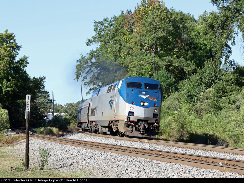 AMTK 81 leads train P080-07 away from the station